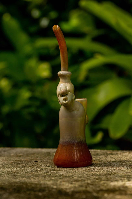 artisan-crafted design of the (Gomez 22) Silver Strike / Persimmon Neolithic Heady Rig by Gomez Glass
