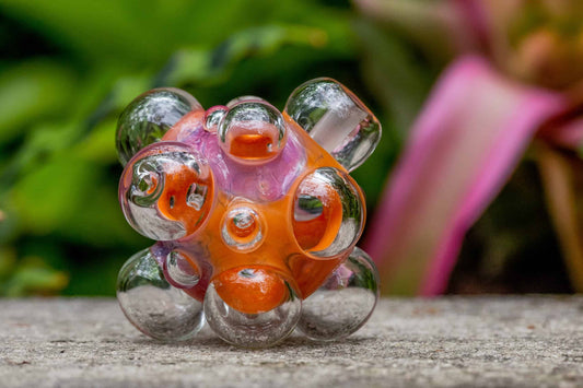 hand-blown design of the Orange/Pink Scribble Bubball Rig by Scomo Moanet