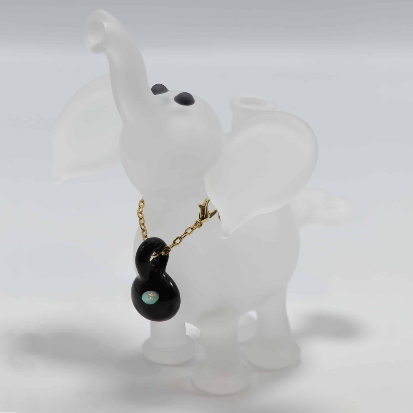 sophisticated design of the Clear Small Sandblasted Elephant Rig by Flame Princess Glass