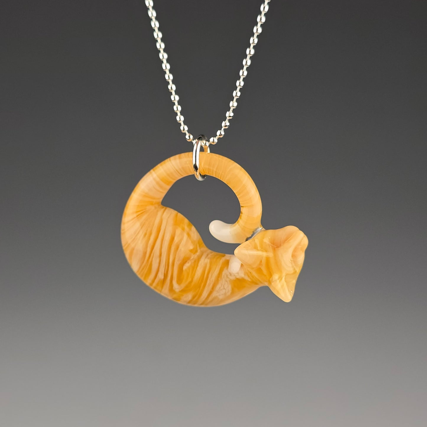 Orange Tabby with cream tipped tail/belly Small Sleeping Kitty Pendant by Spiller Woods (2025)