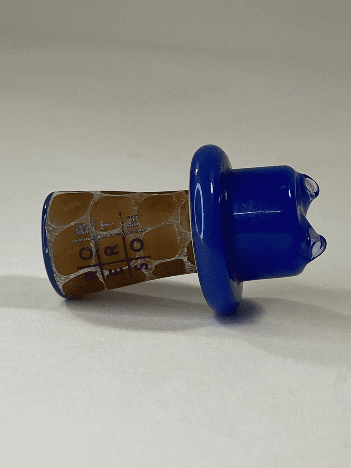 unique design of the Blue Spinner Cap by Robertson Glass