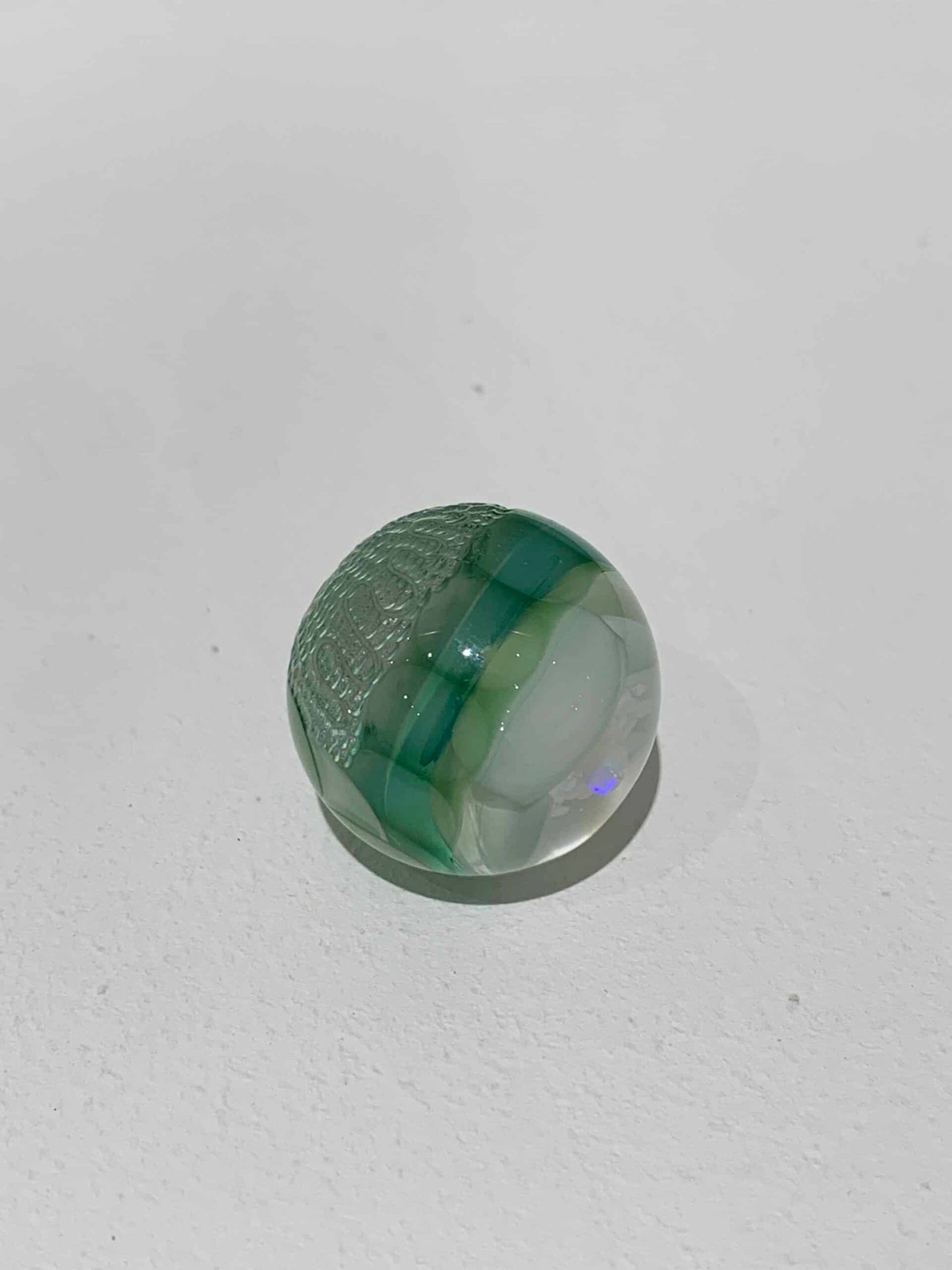 heady art piece - Green & White Marble by Jared DeLong (Trinkets & Tokens 2022)