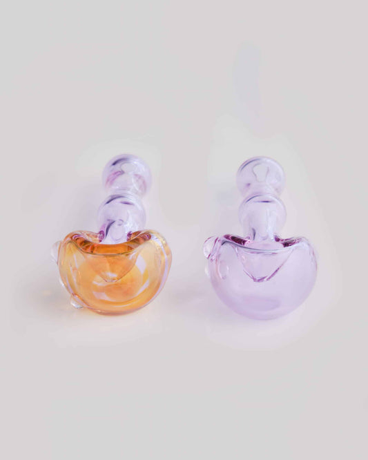 meticulously crafted design of the Pink/Yellow Spoon Pipe w/ Blue Swirl by Willy That Glass Guy