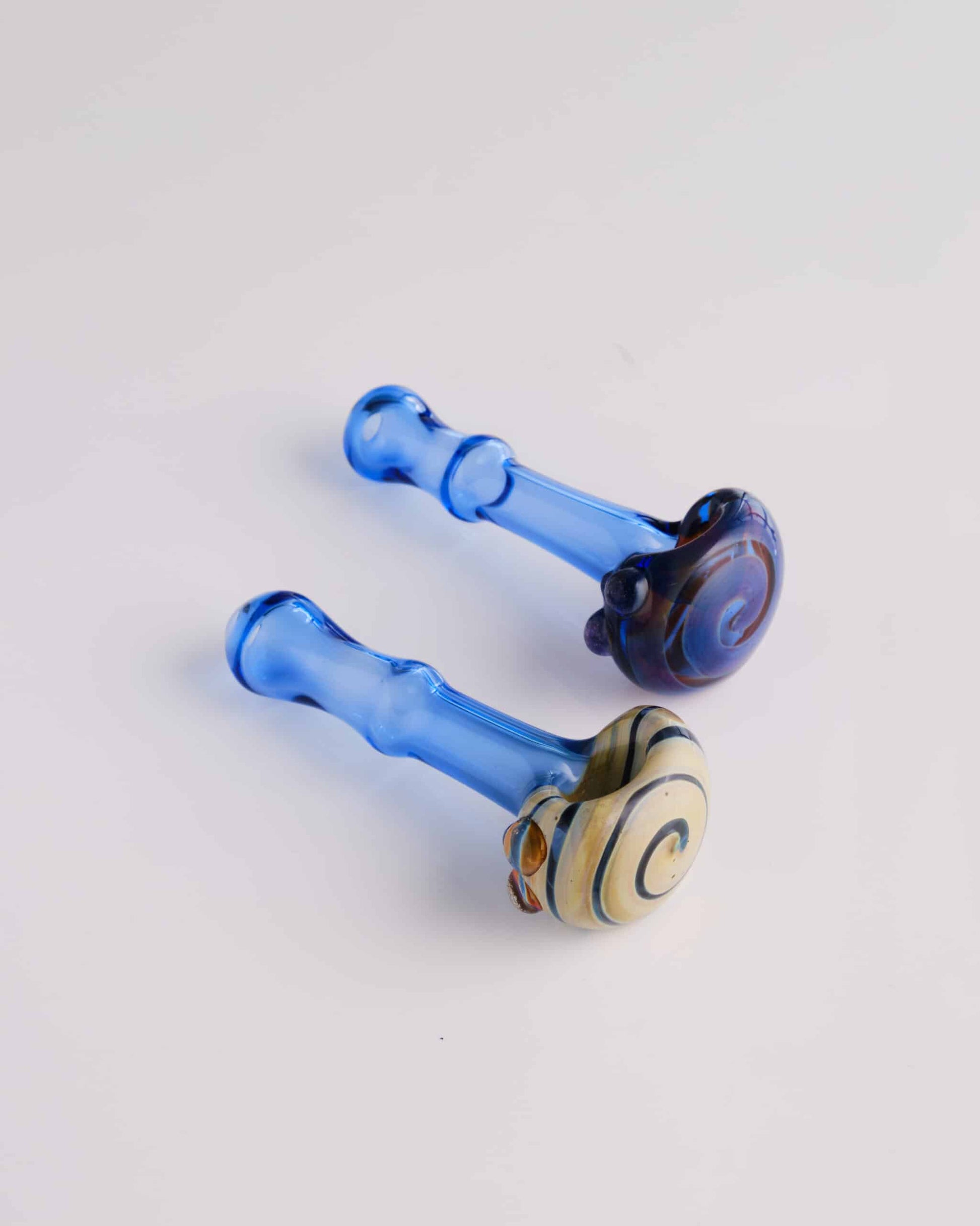 luxurious design of the Blue Spoon Pipe w/ Yellow Swirl by Willy That Glass Guy