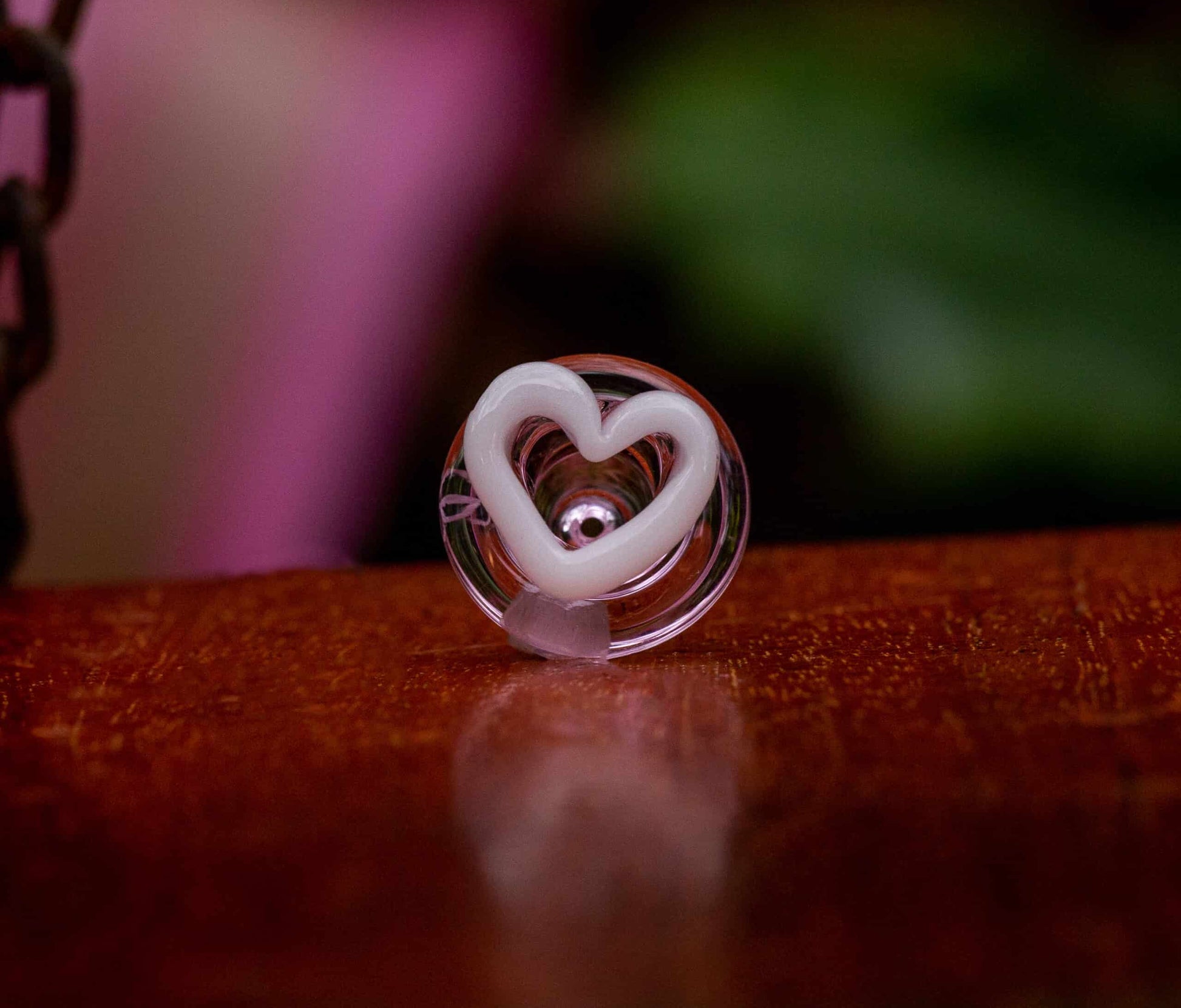 unique design of the (SP2) Transparent Pink / White Heart Puffco Peak Carb Cap by Sakibomb