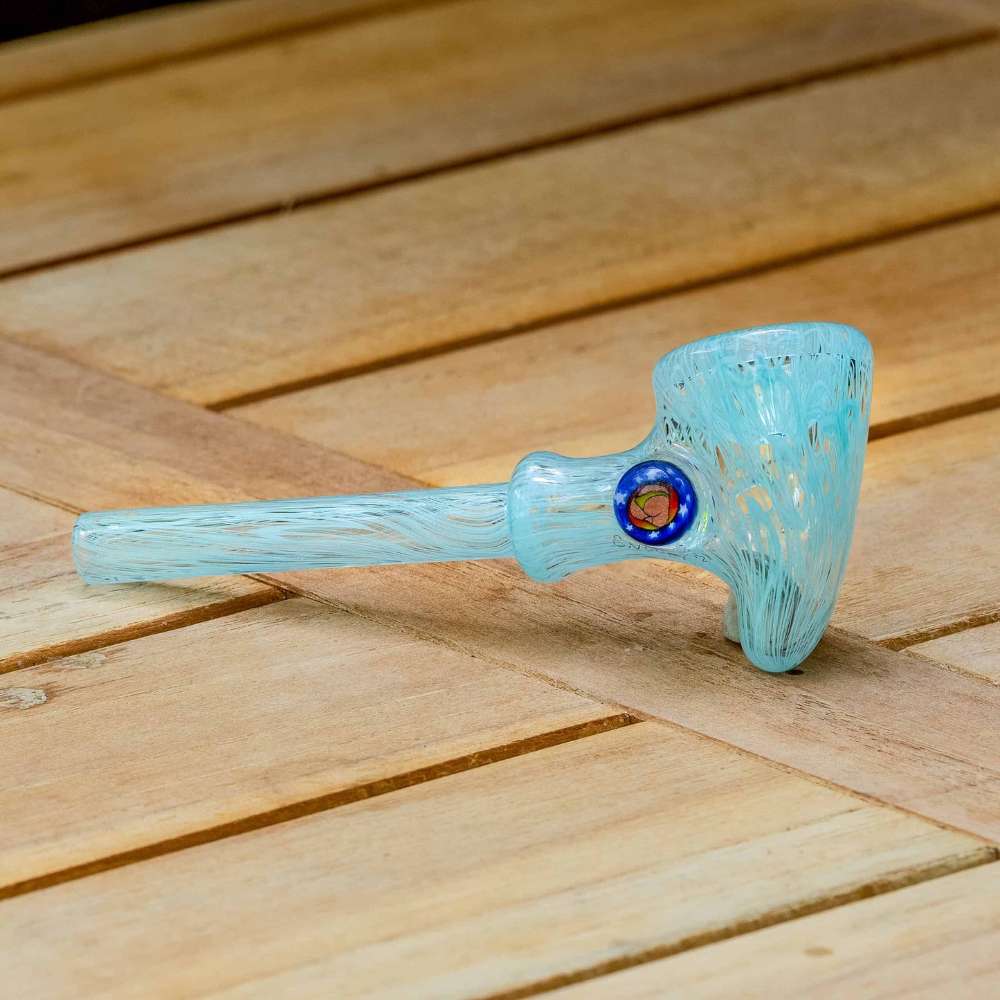 exquisite design of the Agua Azul Fully Worked Tomahawk Dry Pipe (with milli) by Snoopy Glass