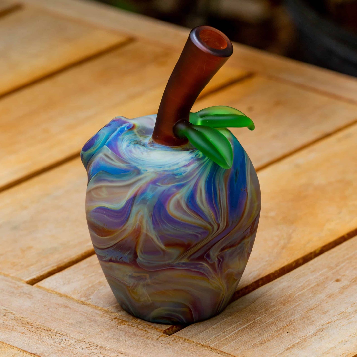 hand-blown design of the Double Amber Purple Chaos Tech Apple Rig by Pouch Glass