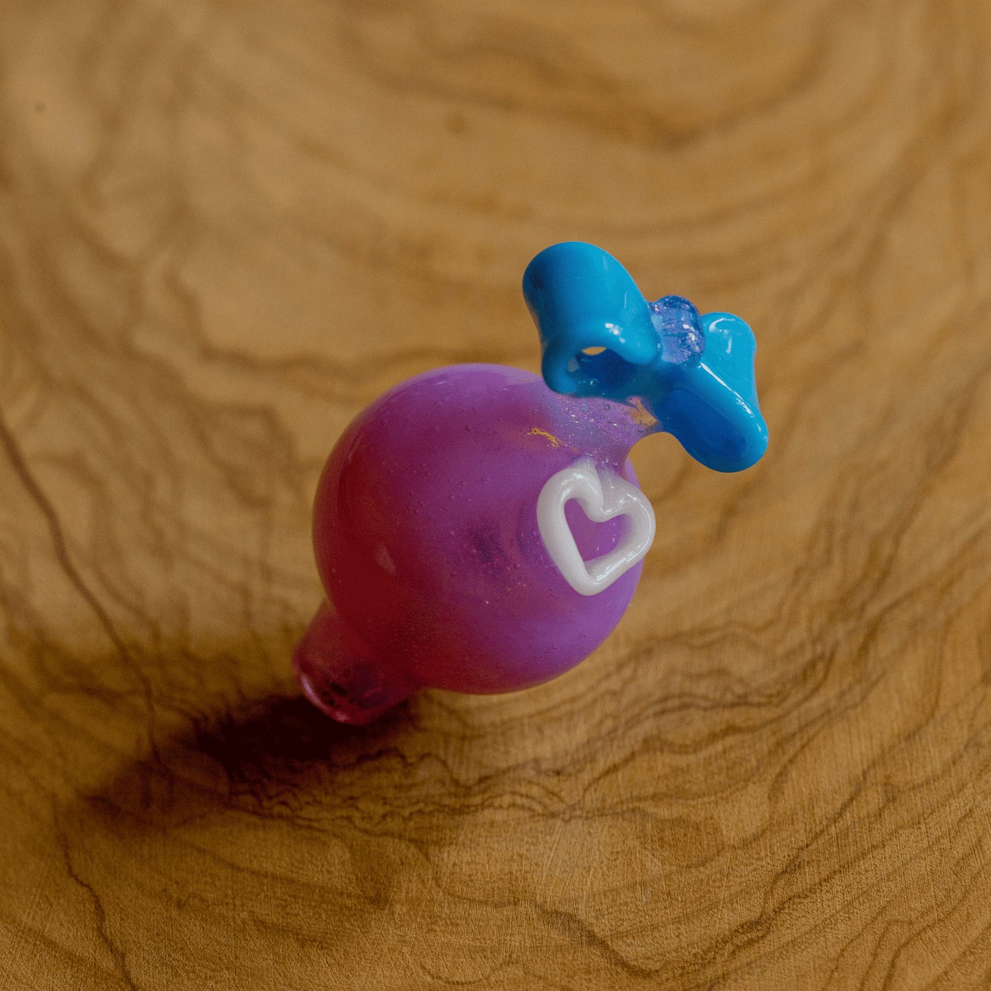 premium quality design of the Purple Carb Cap w/ Heart & Blue Bow by Sakibomb