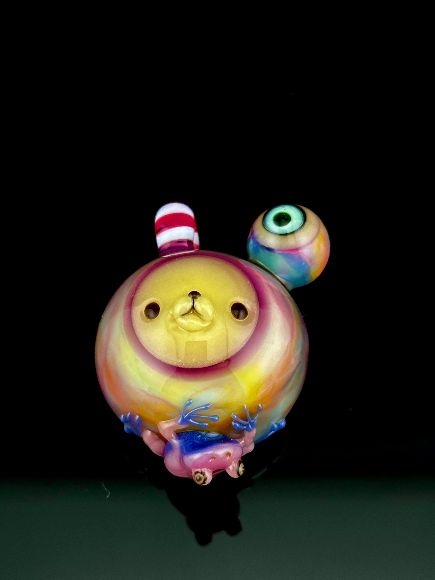 Aquarius chappy head with frog and eye pendant