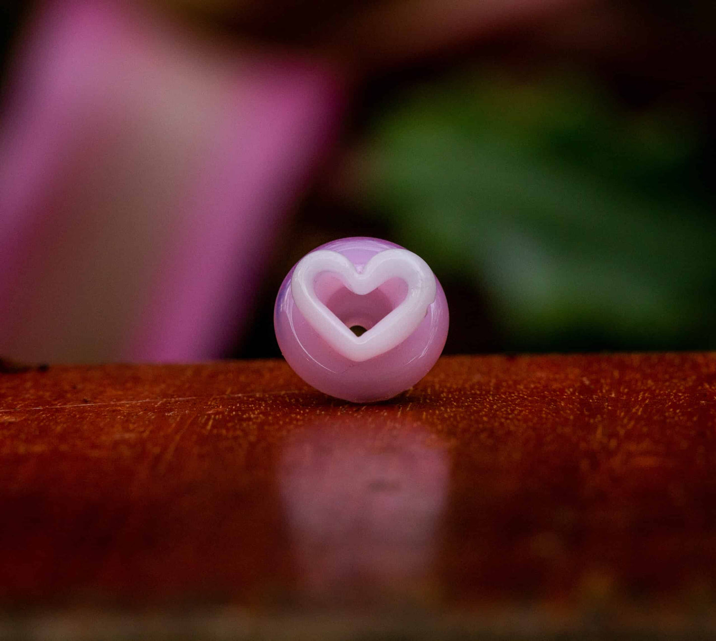 premium quality design of the (SP5) Solid Pink / Glow In The Dark UV White Heart Puffco Peak Carb Cap by Sakibomb