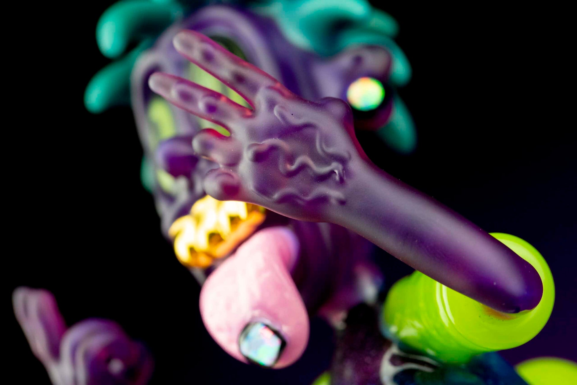 hand-blown design of the Fume City Glass Collaboration Half Body Rig w/ Opal Earrings & Gold Grill by Ryder Glass