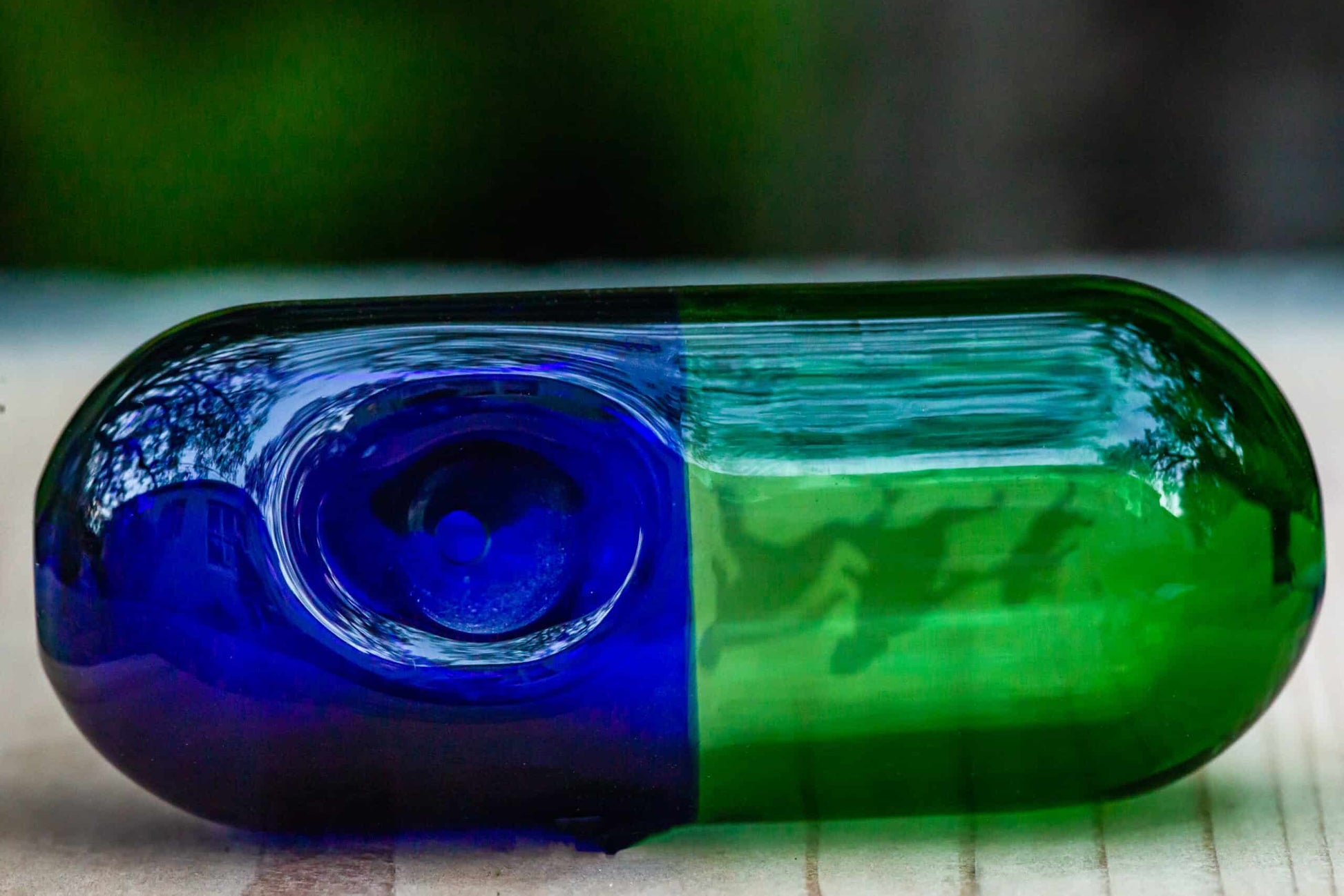 exquisite design of the Green & Blue Pill Hand Pipe by JAG
