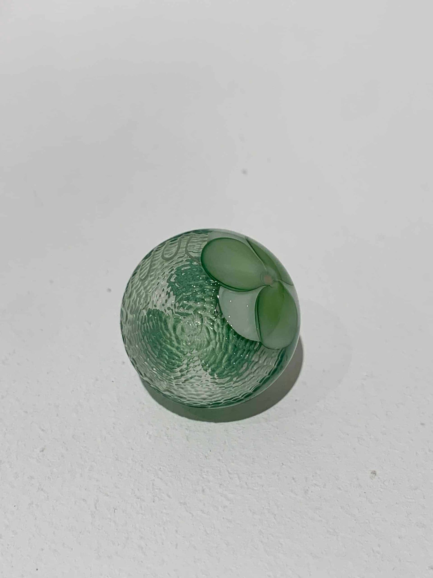 heady art piece - Green & White Marble by Jared DeLong (Trinkets & Tokens 2022)